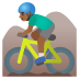 🚵🏾‍♂️ man mountain biking: medium-dark skin tone display on Google